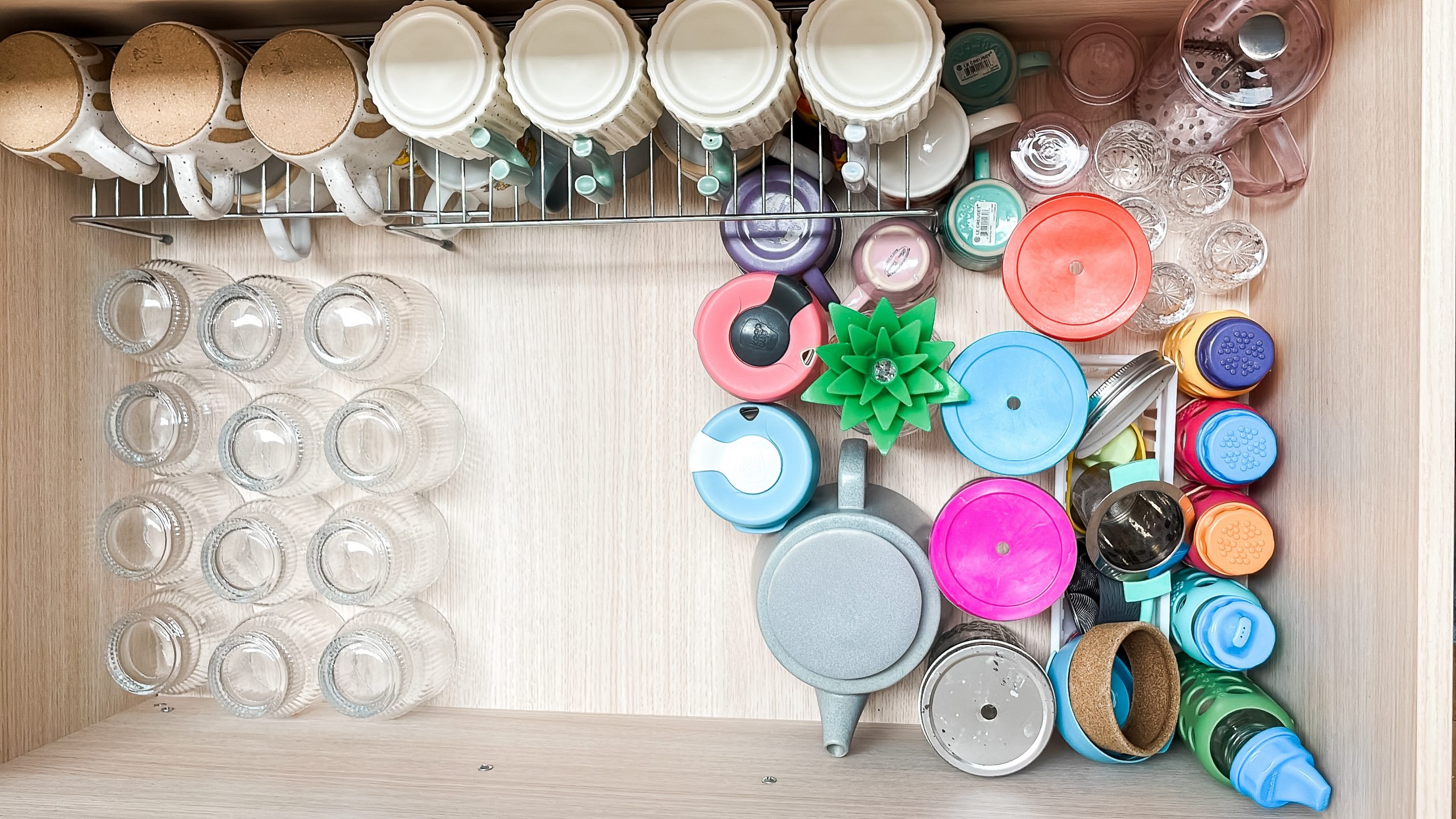 Organising glasses & drink bottles in a small kitchen stacey clare